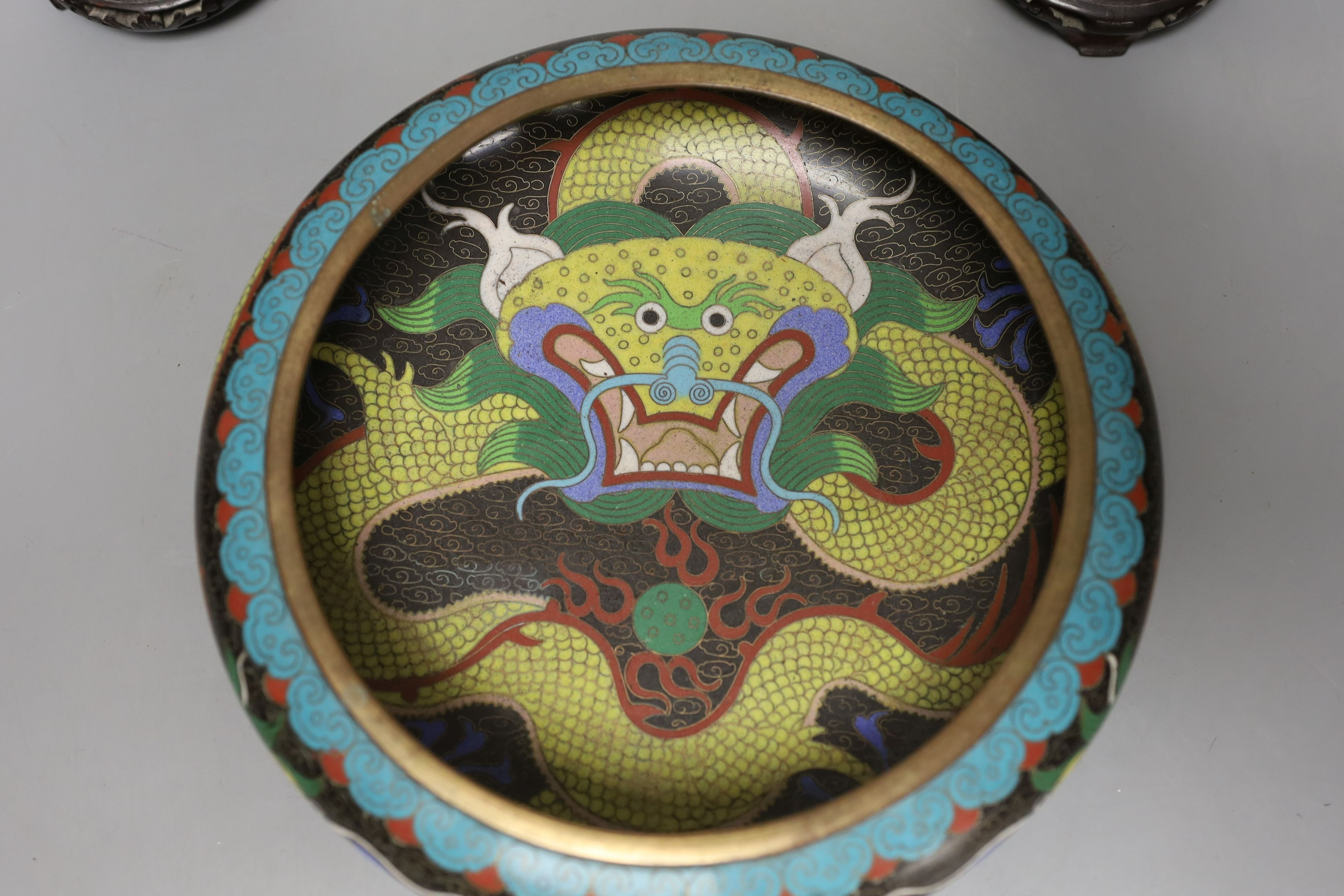 A pair of Chinese cloisonné enamel vases, 25cm tall including stands, together with a Chinese cloisonné enamel dragon bowl (3)